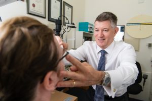 Eye tests at Focus Optometrists Sherwood QLD Simon Hurwood with a patient